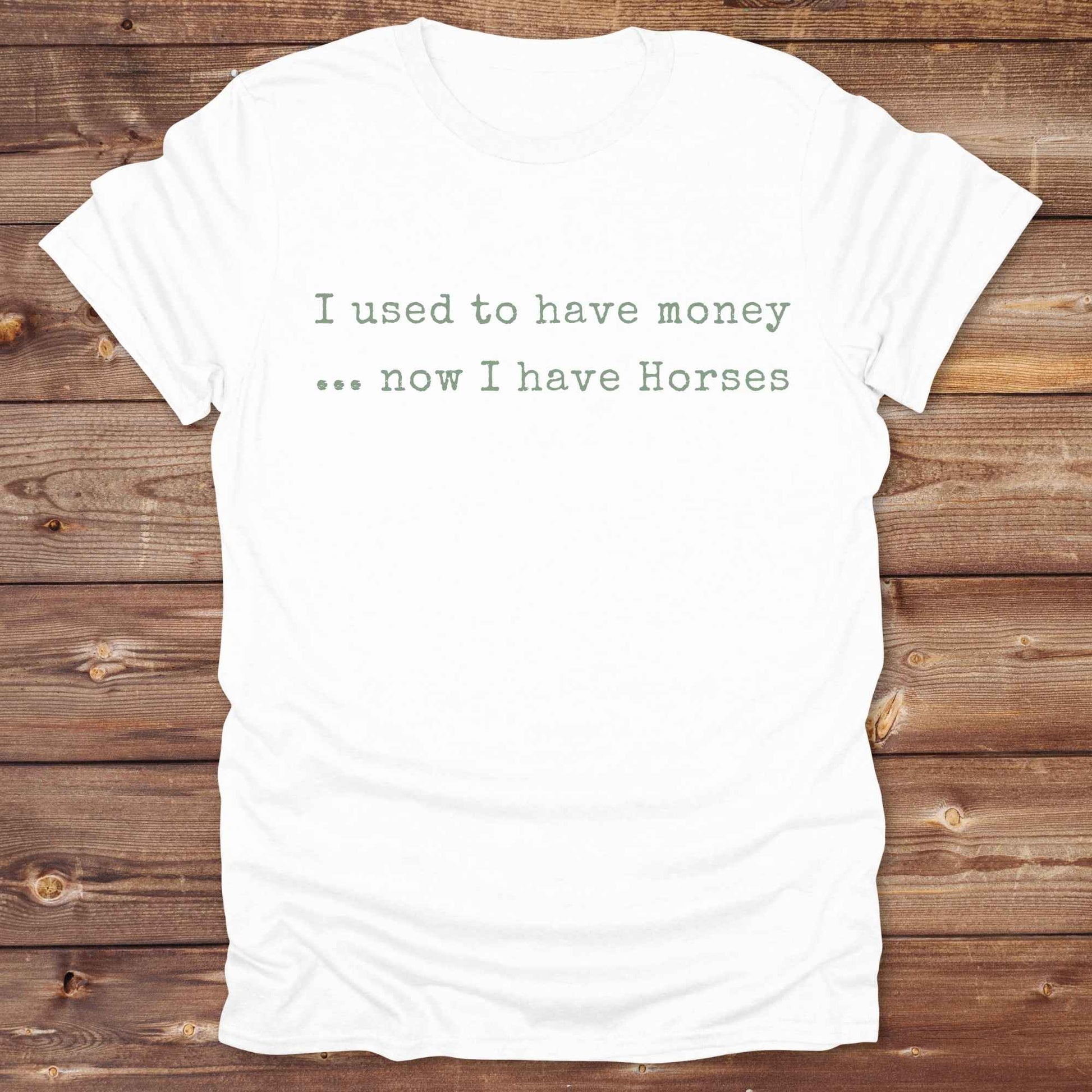This “I Used to Have Money… Now I Have Horses” tee is made for cowgirls, cowboys, and equestrians who know the true cost of horse life and still love it. Perfect for barn days, rodeo weekends, or country fairs, this shirt brings horse humor to your everyday wardrobe. t’s a hilarious gift for horse lovers, horse moms, ranch workers, and anyone whose paycheck goes straight to hay.