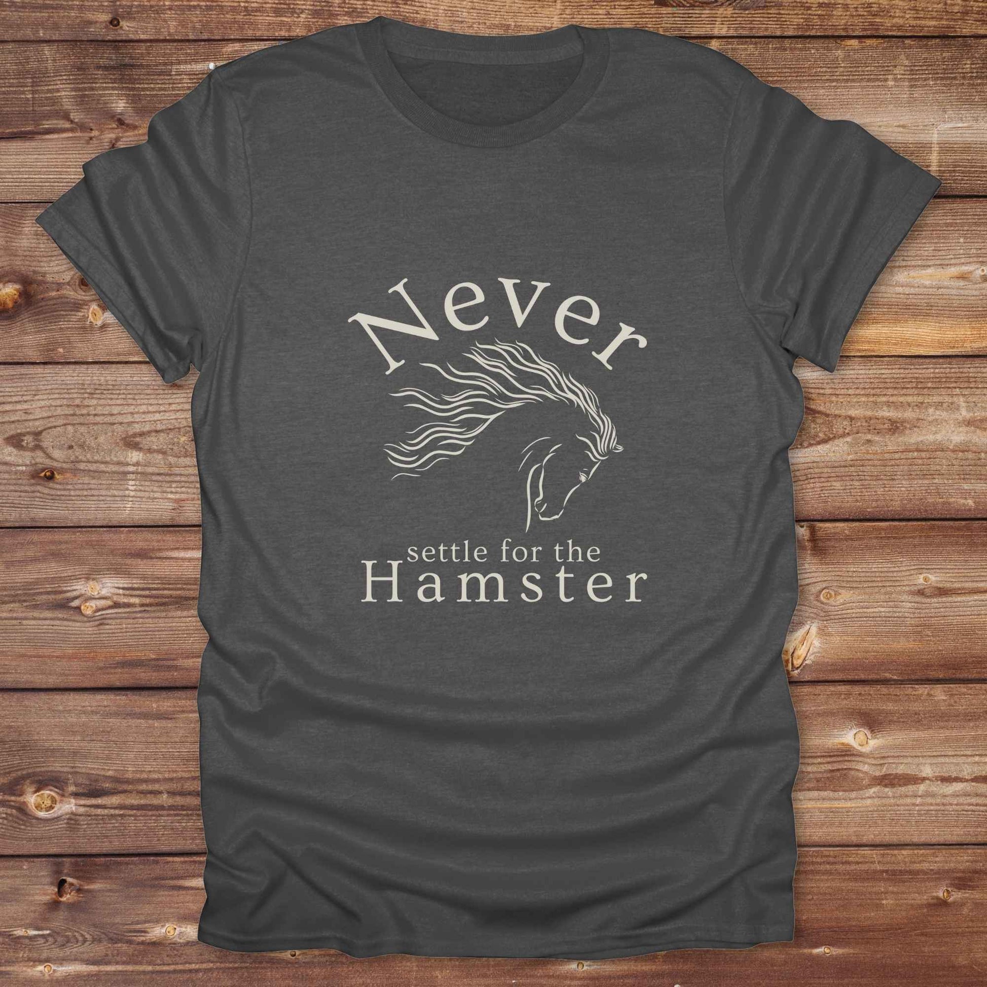 "Never Settle for the Hamster" T-shirt a funny and empowering western tee designed for horse lovers, cowgirls, and cowboy humor fans. Bold typography and flowing horse graphic, perfect for rodeo events, country fairs, or everyday ranch life. Whether you're buying for yourself or gifting to a wild-hearted horse girl, this shirt makes a statement that’s as fierce as your spirit.
