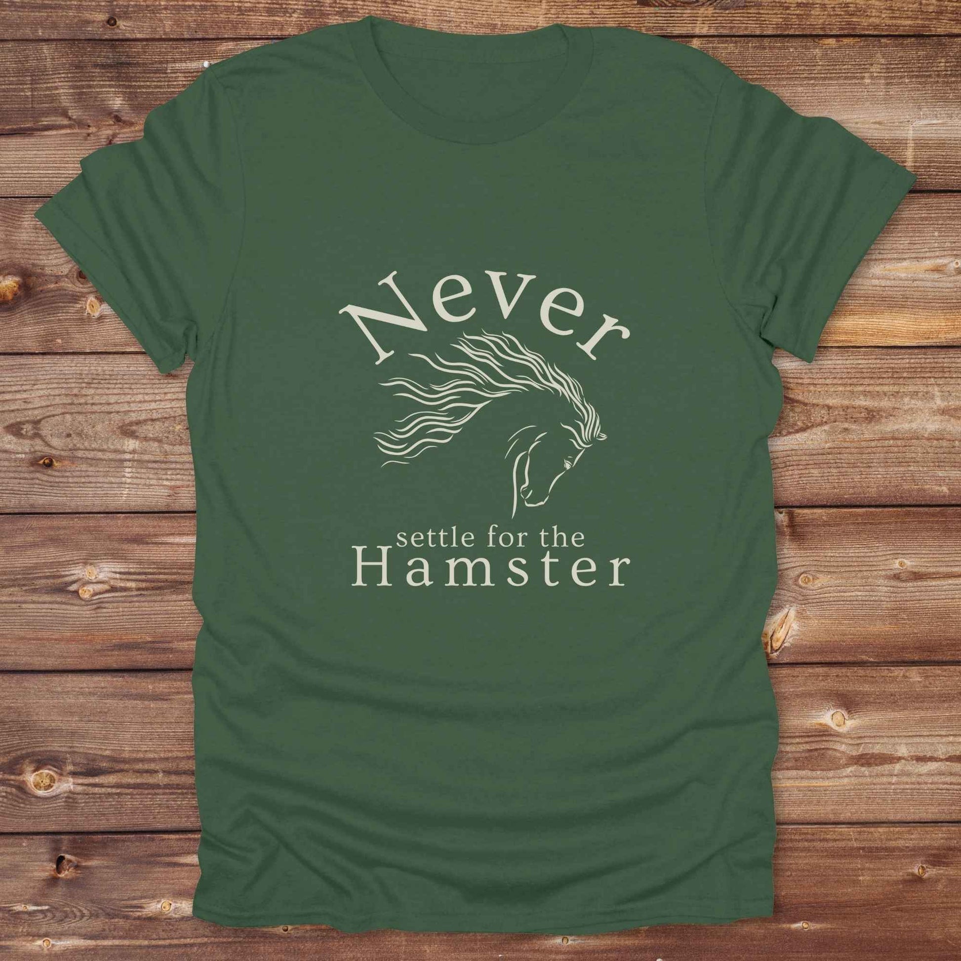 "Never Settle for the Hamster" T-shirt a funny and empowering western tee designed for horse lovers, cowgirls, and cowboy humor fans. Bold typography and flowing horse graphic, perfect for rodeo events, country fairs, or everyday ranch life. Whether you're buying for yourself or gifting to a wild-hearted horse girl, this shirt makes a statement that’s as fierce as your spirit.