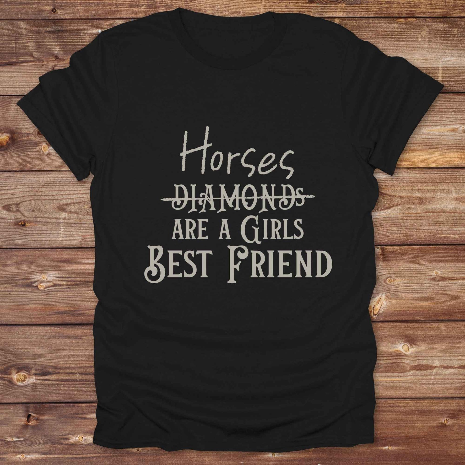 “Horses Are a Girl’s Best Friend” tee from Lasso and Loom is the perfect blend of sass and saddle ready style. Featuring a rustic hand lettered graphic with the word Diamonds cheekily crossed out, this cowgirl shirt celebrates equestrian passion in the most fashionable way. Ideal as a gift for horse lovers, western girls, and rural soul sisters. Whether you're trail riding, shopping small, or posting from the paddock, this shirt says what every horse girl already knows, diamonds don’t ride.