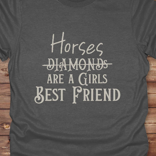 “Horses Are a Girl’s Best Friend” tee from Lasso and Loom is the perfect blend of sass and saddle ready style. Featuring a rustic hand lettered graphic with the word Diamonds cheekily crossed out, this cowgirl shirt celebrates equestrian passion in the most fashionable way. Ideal as a gift for horse lovers, western girls, and rural soul sisters. Whether you're trail riding, shopping small, or posting from the paddock, this shirt says what every horse girl already knows, diamonds don’t ride.