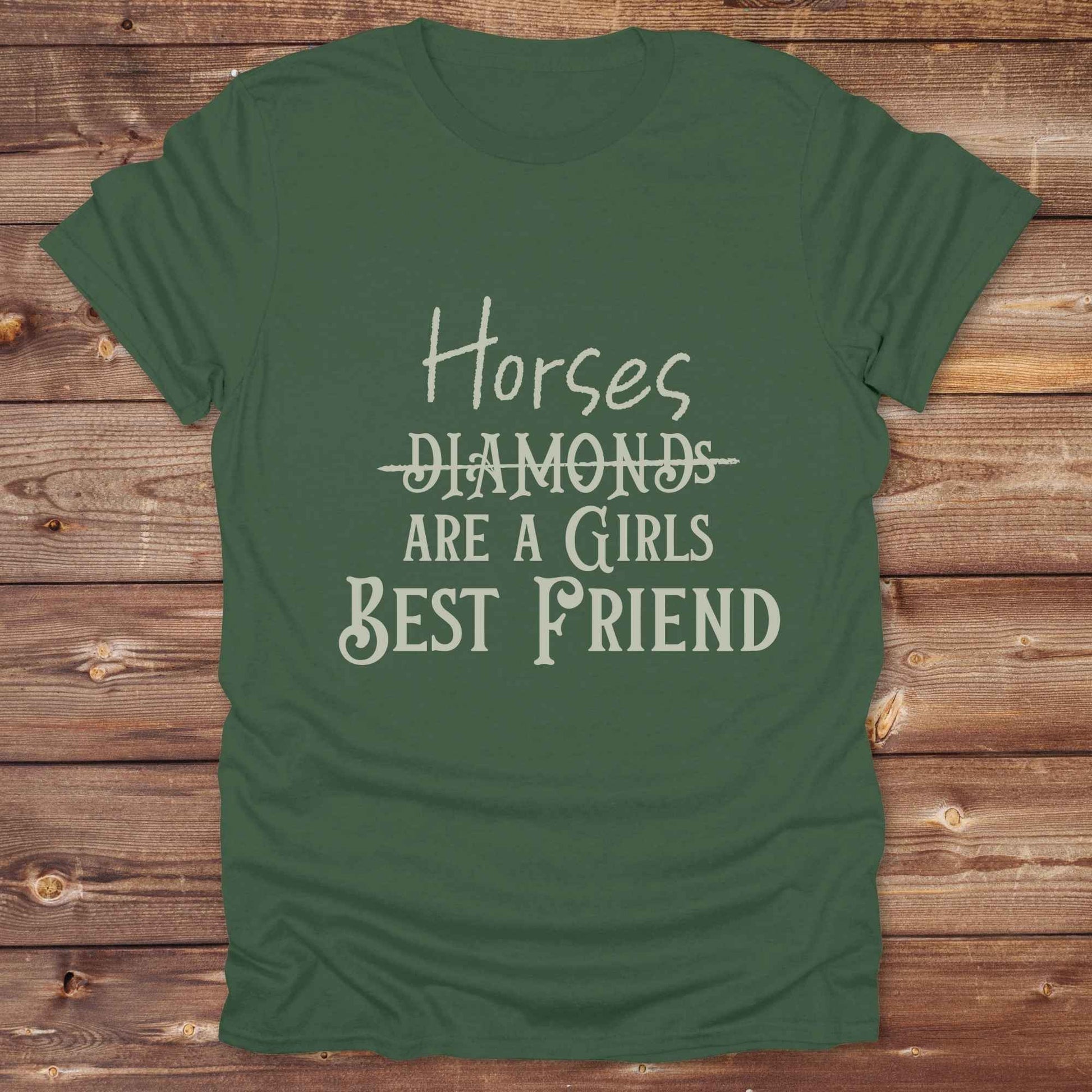 “Horses Are a Girl’s Best Friend” tee from Lasso and Loom is the perfect blend of sass and saddle ready style. Featuring a rustic hand lettered graphic with the word Diamonds cheekily crossed out, this cowgirl shirt celebrates equestrian passion in the most fashionable way. Ideal as a gift for horse lovers, western girls, and rural soul sisters. Whether you're trail riding, shopping small, or posting from the paddock, this shirt says what every horse girl already knows, diamonds don’t ride.