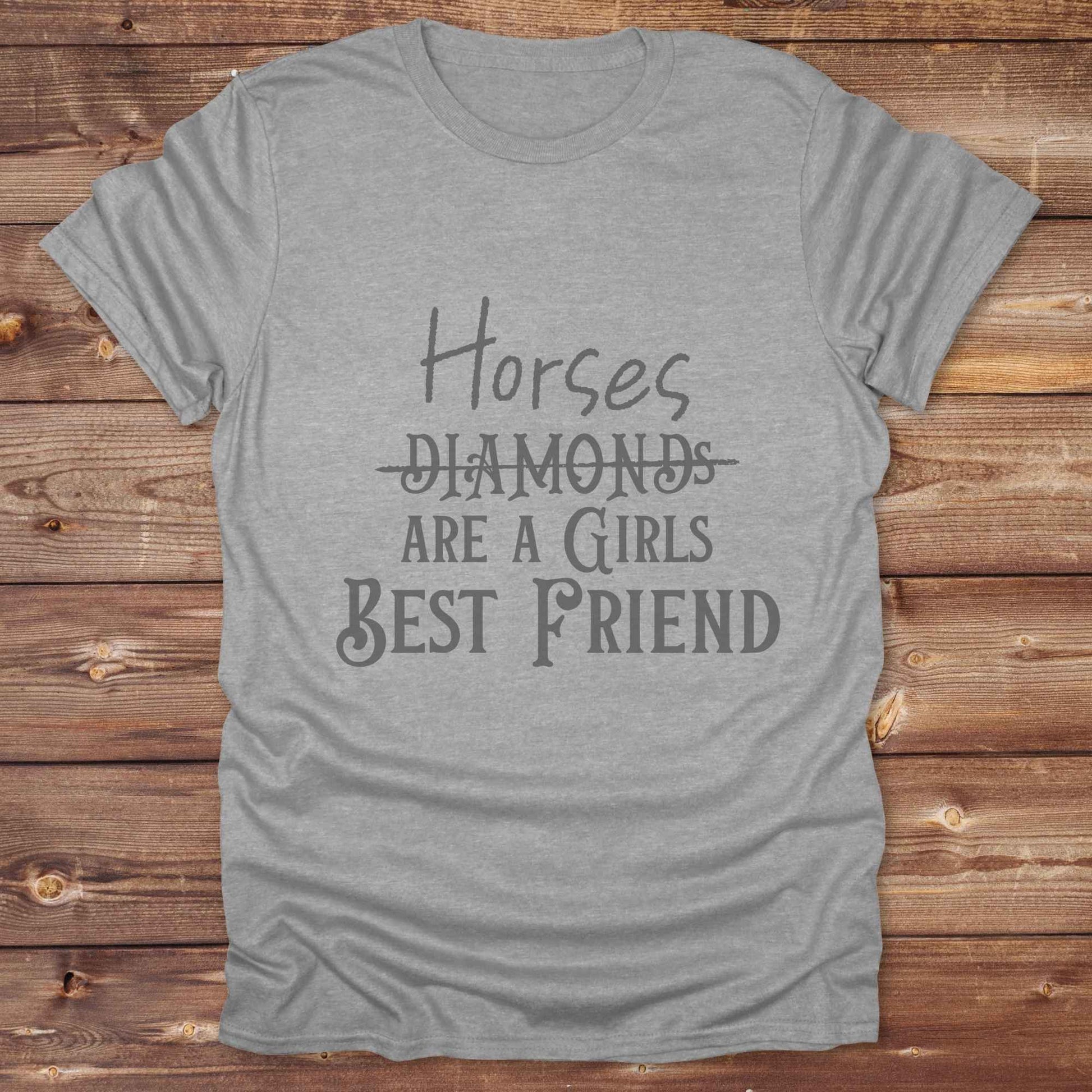 “Horses Are a Girl’s Best Friend” tee from Lasso and Loom is the perfect blend of sass and saddle ready style. Featuring a rustic hand lettered graphic with the word Diamonds cheekily crossed out, this cowgirl shirt celebrates equestrian passion in the most fashionable way. Ideal as a gift for horse lovers, western girls, and rural soul sisters. Whether you're trail riding, shopping small, or posting from the paddock, this shirt says what every horse girl already knows, diamonds don’t ride.