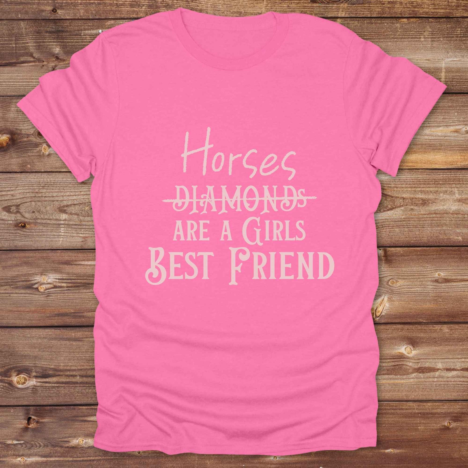 “Horses Are a Girl’s Best Friend” tee from Lasso and Loom is the perfect blend of sass and saddle ready style. Featuring a rustic hand lettered graphic with the word Diamonds cheekily crossed out, this cowgirl shirt celebrates equestrian passion in the most fashionable way. Ideal as a gift for horse lovers, western girls, and rural soul sisters. Whether you're trail riding, shopping small, or posting from the paddock, this shirt says what every horse girl already knows, diamonds don’t ride.