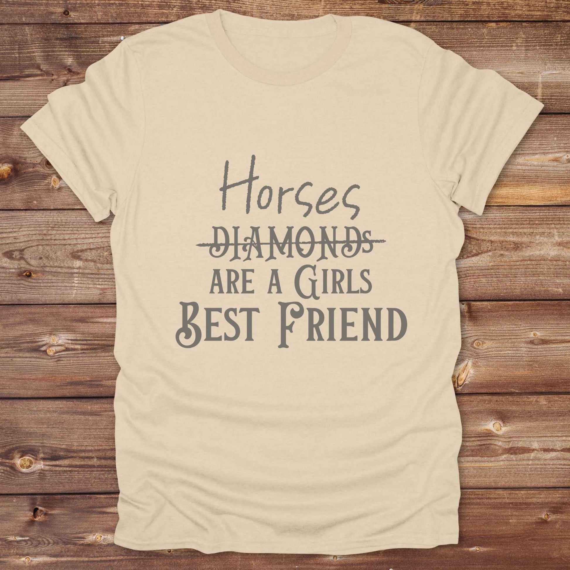 “Horses Are a Girl’s Best Friend” tee from Lasso and Loom is the perfect blend of sass and saddle ready style. Featuring a rustic hand lettered graphic with the word Diamonds cheekily crossed out, this cowgirl shirt celebrates equestrian passion in the most fashionable way. Ideal as a gift for horse lovers, western girls, and rural soul sisters. Whether you're trail riding, shopping small, or posting from the paddock, this shirt says what every horse girl already knows, diamonds don’t ride.