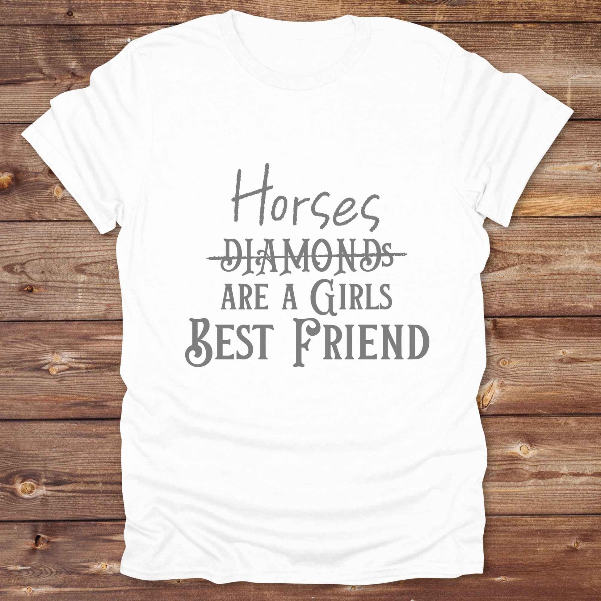 “Horses Are a Girl’s Best Friend” tee from Lasso and Loom is the perfect blend of sass and saddle ready style. Featuring a rustic hand lettered graphic with the word Diamonds cheekily crossed out, this cowgirl shirt celebrates equestrian passion in the most fashionable way. Ideal as a gift for horse lovers, western girls, and rural soul sisters. Whether you're trail riding, shopping small, or posting from the paddock, this shirt says what every horse girl already knows, diamonds don’t ride.
