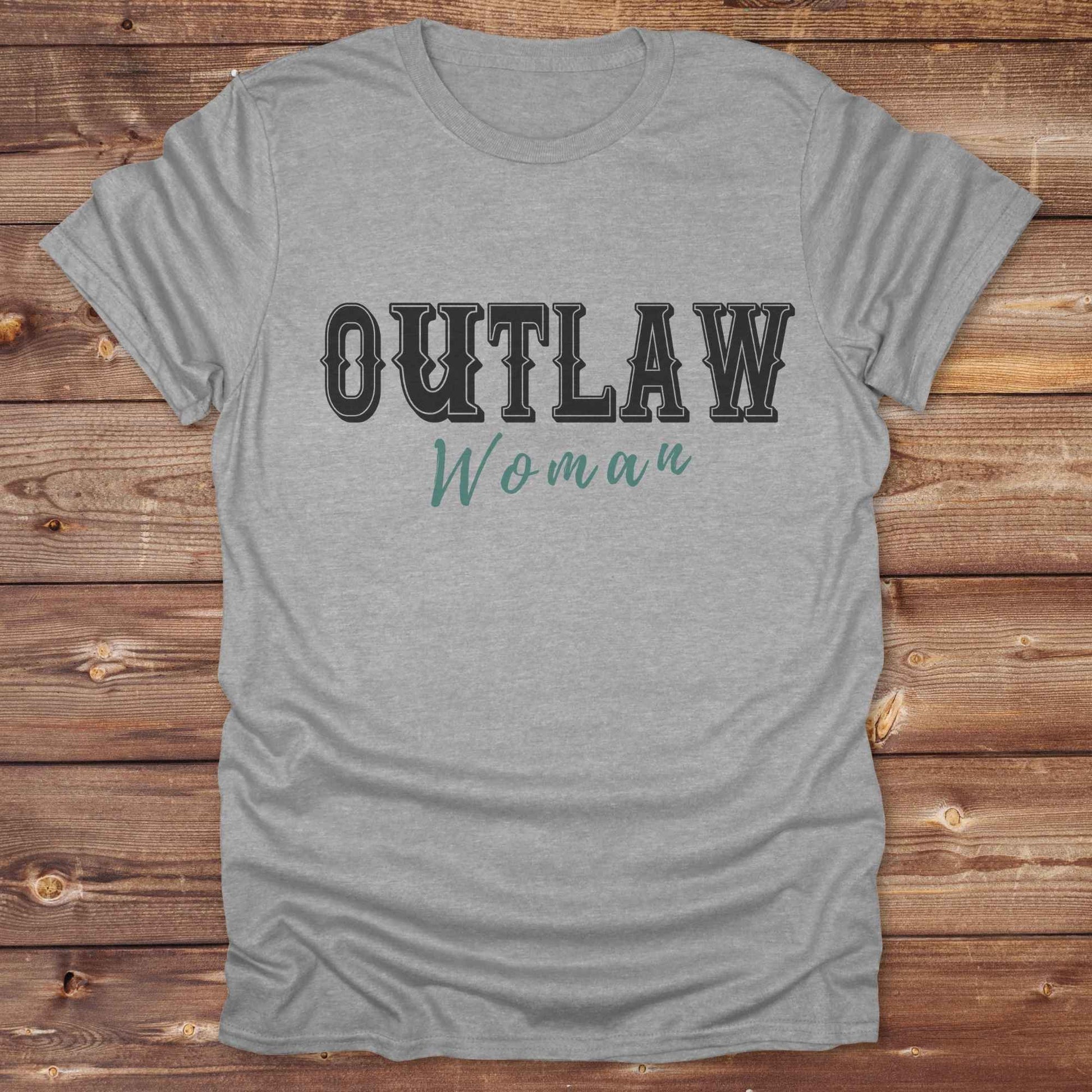 Unleash your inner cowgirl with our Outlaw Woman T-Shirt — a bold, western-inspired tee made for fierce, free-spirited women. Featuring vintage typography and rustic charm, it’s the perfect fit for country girls, rodeo lovers, and horse-riding rebels alike. Ideal as a unique gift or statement piece, this shirt pairs classic outlaw vibes with soft, wearable comfort. Whether you're hitting the trails, rocking the fairgrounds, or lounging in cowgirl style, this tee says you’re wild and proud.
