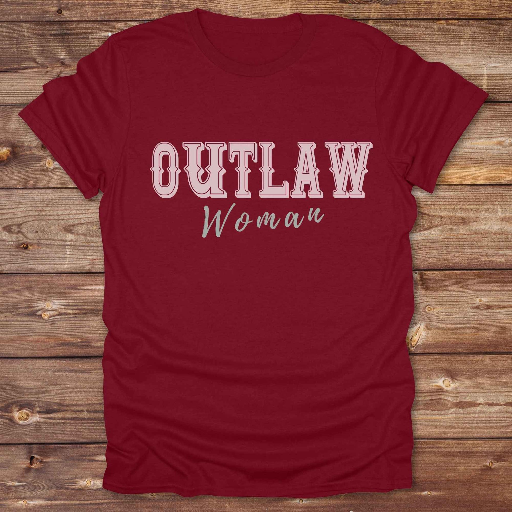 Unleash your inner cowgirl with our Outlaw Woman T-Shirt — a bold, western-inspired tee made for fierce, free-spirited women. Featuring vintage typography and rustic charm, it’s the perfect fit for country girls, rodeo lovers, and horse-riding rebels alike. Ideal as a unique gift or statement piece, this shirt pairs classic outlaw vibes with soft, wearable comfort. Whether you're hitting the trails, rocking the fairgrounds, or lounging in cowgirl style, this tee says you’re wild and proud.