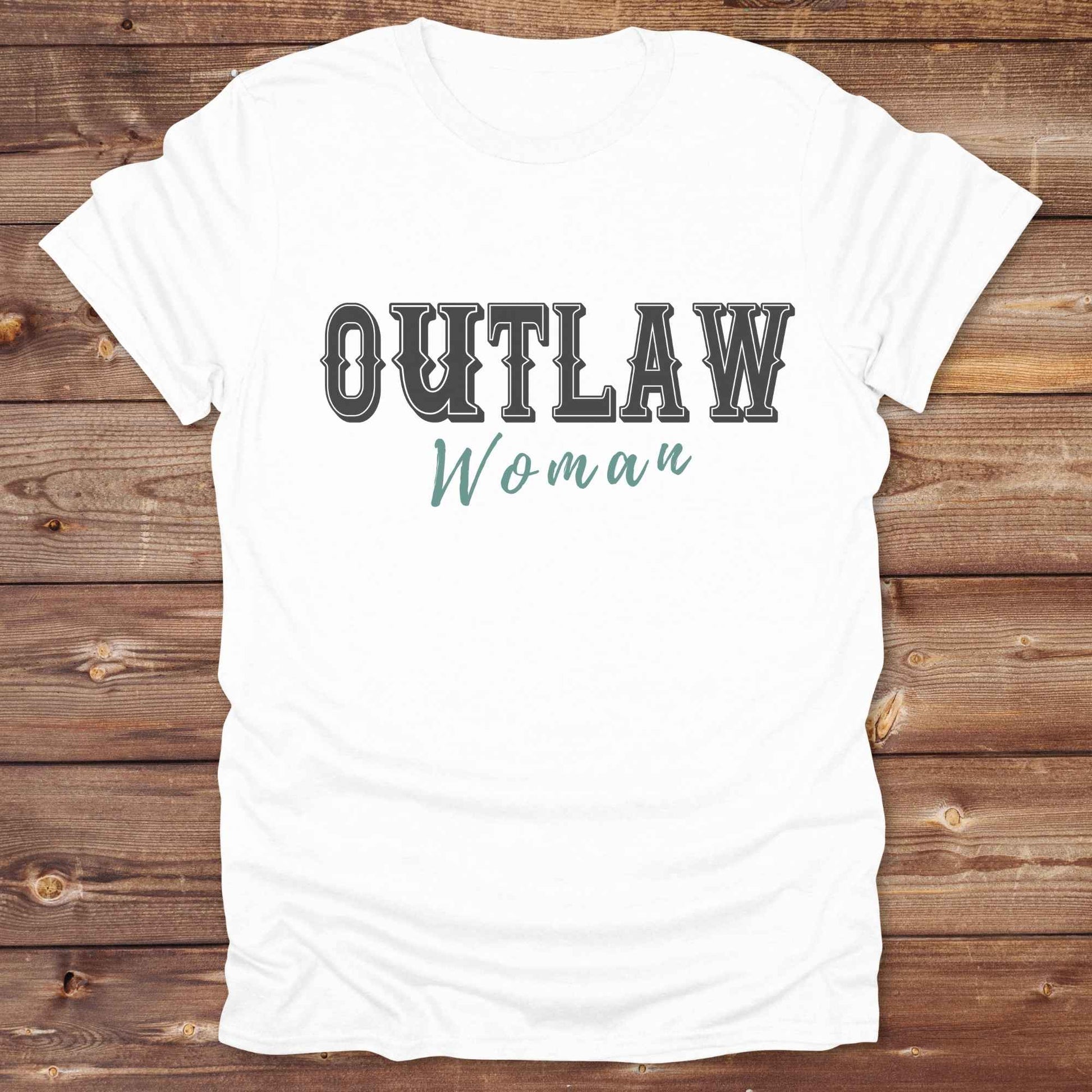 Unleash your inner cowgirl with our Outlaw Woman T-Shirt — a bold, western-inspired tee made for fierce, free-spirited women. Featuring vintage typography and rustic charm, it’s the perfect fit for country girls, rodeo lovers, and horse-riding rebels alike. Ideal as a unique gift or statement piece, this shirt pairs classic outlaw vibes with soft, wearable comfort. Whether you're hitting the trails, rocking the fairgrounds, or lounging in cowgirl style, this tee says you’re wild and proud.