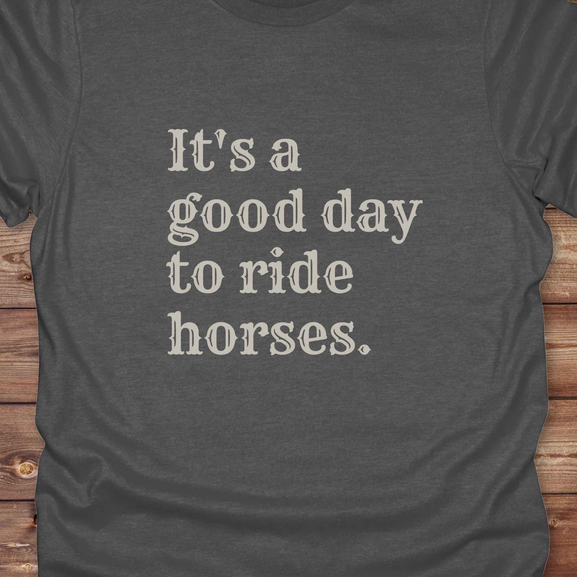 “It’s a Good Day to Ride Horses” t-shirt. Designed for horse lovers, cowgirls, cowboys, and rodeo fans, this rustic tee is a perfect fit for barn life, trail rides, and daily adventures. C. Top selling graphic tee captures the heart of equestrian style and country freedom. Ideal as a birthday gift, casual statement piece, or rodeo outfit, this tee is a must have for saddle up days and western quotes that ride with meaning. Loved by riders, designed for style.