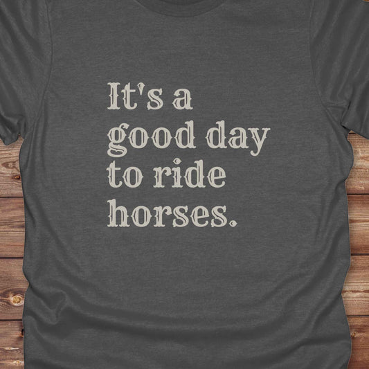 “It’s a Good Day to Ride Horses” t-shirt. Designed for horse lovers, cowgirls, cowboys, and rodeo fans, this rustic tee is a perfect fit for barn life, trail rides, and daily adventures. C. Top selling graphic tee captures the heart of equestrian style and country freedom. Ideal as a birthday gift, casual statement piece, or rodeo outfit, this tee is a must have for saddle up days and western quotes that ride with meaning. Loved by riders, designed for style.