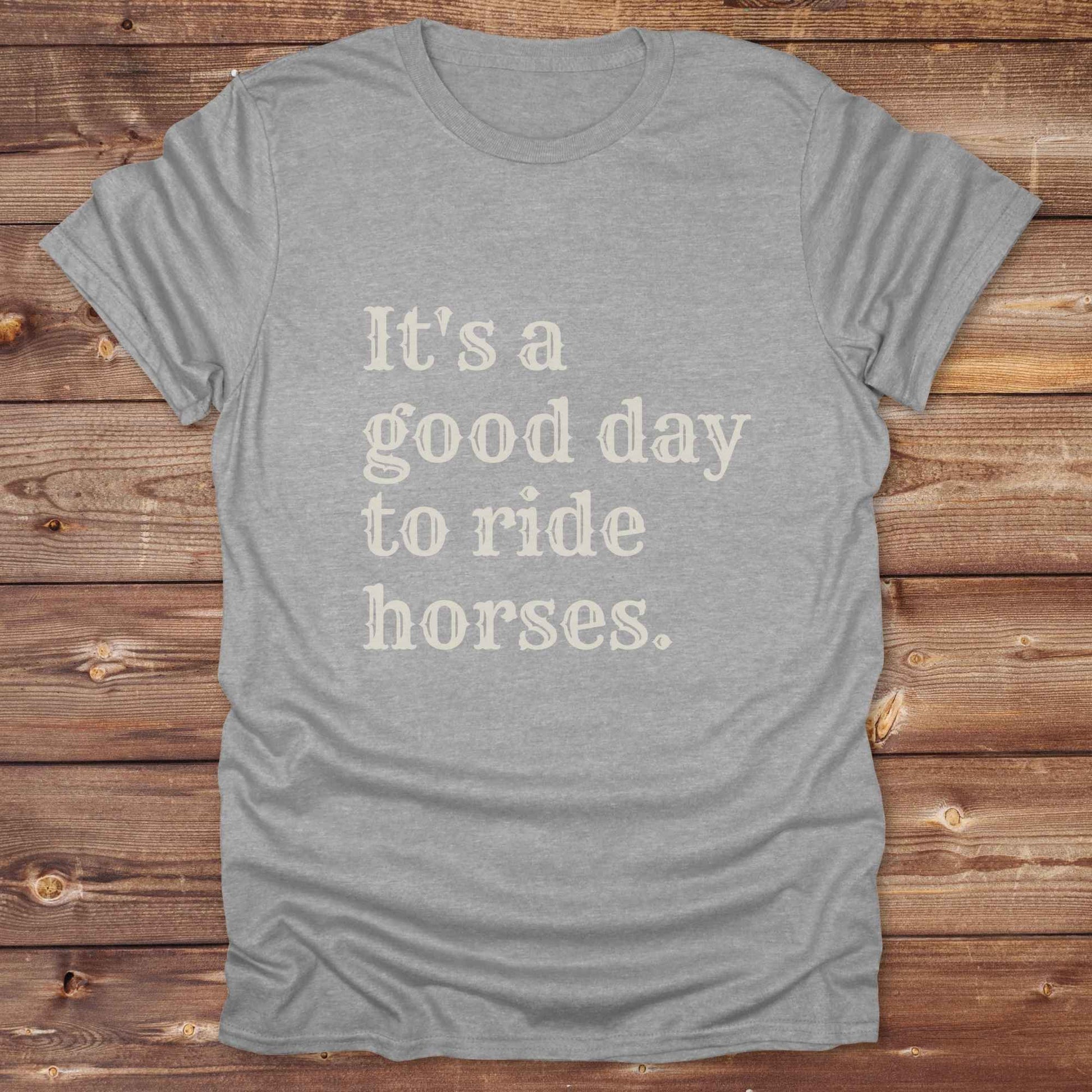 “It’s a Good Day to Ride Horses” t-shirt. Designed for horse lovers, cowgirls, cowboys, and rodeo fans, this rustic tee is a perfect fit for barn life, trail rides, and daily adventures. C. Top selling graphic tee captures the heart of equestrian style and country freedom. Ideal as a birthday gift, casual statement piece, or rodeo outfit, this tee is a must have for saddle up days and western quotes that ride with meaning. Loved by riders, designed for style.