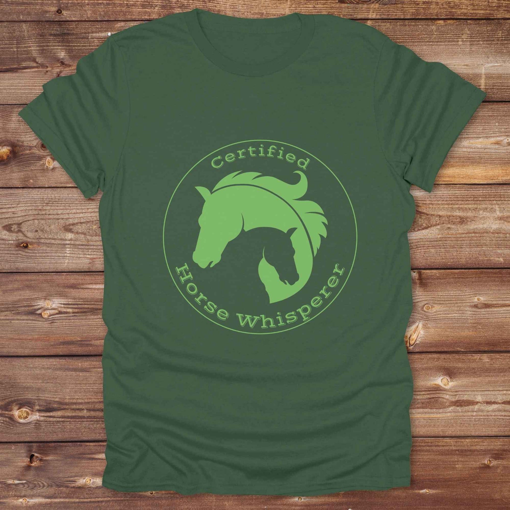 Certified Horse Whisperer T-Shirt is the perfect blend of rustic charm and equestrian elegance. Designed for horse lovers, cowboys, cowgirls, and trainers, this soft unisex graphic tee showcases a minimalist silhouette of two horses within a bold “Certified Horse Whisperer” typographic circle. It's a great gift for birthdays, rodeo fans, western riders, and anyone practicing natural horsemanship or quiet leadership. Conversation starter at the barn, rodeo, trail ride, or farmer’s market. Loved by riders.