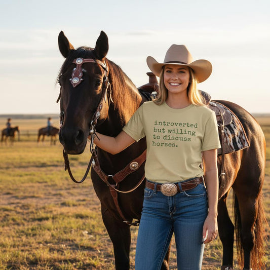 Funny horse lover t-shirt that reads ‘Introverted but willing to discuss horses’ in western typography