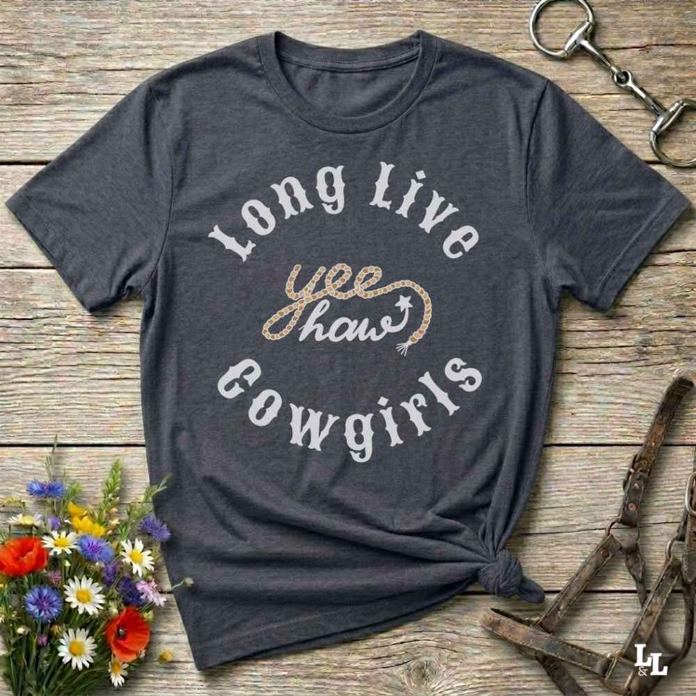 Gray t-shirt with 'Long Live Yee Haw Cowgirls' text on a wooden surface with floral and equestrian-themed accessories.