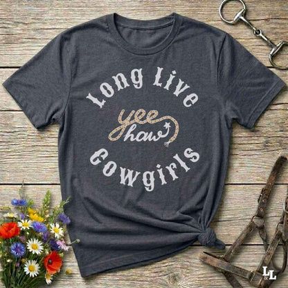 Gray t-shirt with 'Long Live Yee Haw Cowgirls' text on a wooden surface with floral and equestrian-themed accessories.