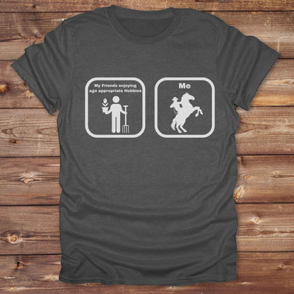 Fun western t-shirt for horse lovers and cowgirls. Western cowgirl graphic tee with horse design. Cowboy humor t-shirt for rodeo and country lovers. Horse lover funny t-shirt with western theme. Country style horse graphic tee for cowboys and cowgirls. Retro style funny western shirt for equestrians. Cute and funny country shirt with horse print. Southern cowgirl funny quote shirt for horse lovers. Age appropriate hobbies.