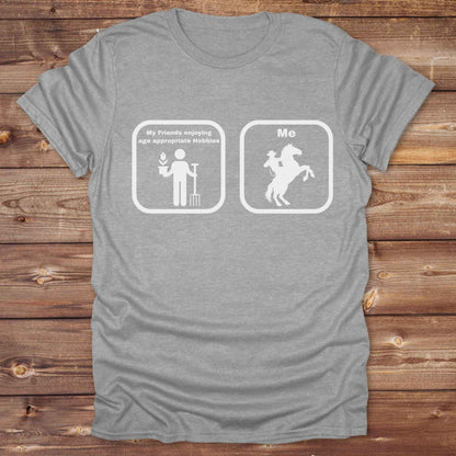 Fun western t-shirt for horse lovers and cowgirls. Western cowgirl graphic tee with horse design. Cowboy humor t-shirt for rodeo and country lovers. Horse lover funny t-shirt with western theme. Country style horse graphic tee for cowboys and cowgirls. Retro style funny western shirt for equestrians. Cute and funny country shirt with horse print. Southern cowgirl funny quote shirt for horse lovers. Age appropriate hobbies.