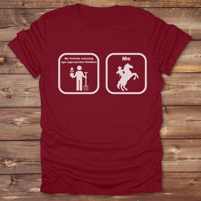 Fun western t-shirt for horse lovers and cowgirls. Western cowgirl graphic tee with horse design. Cowboy humor t-shirt for rodeo and country lovers. Horse lover funny t-shirt with western theme. Country style horse graphic tee for cowboys and cowgirls. Retro style funny western shirt for equestrians. Cute and funny country shirt with horse print. Southern cowgirl funny quote shirt for horse lovers. Age appropriate hobbies.