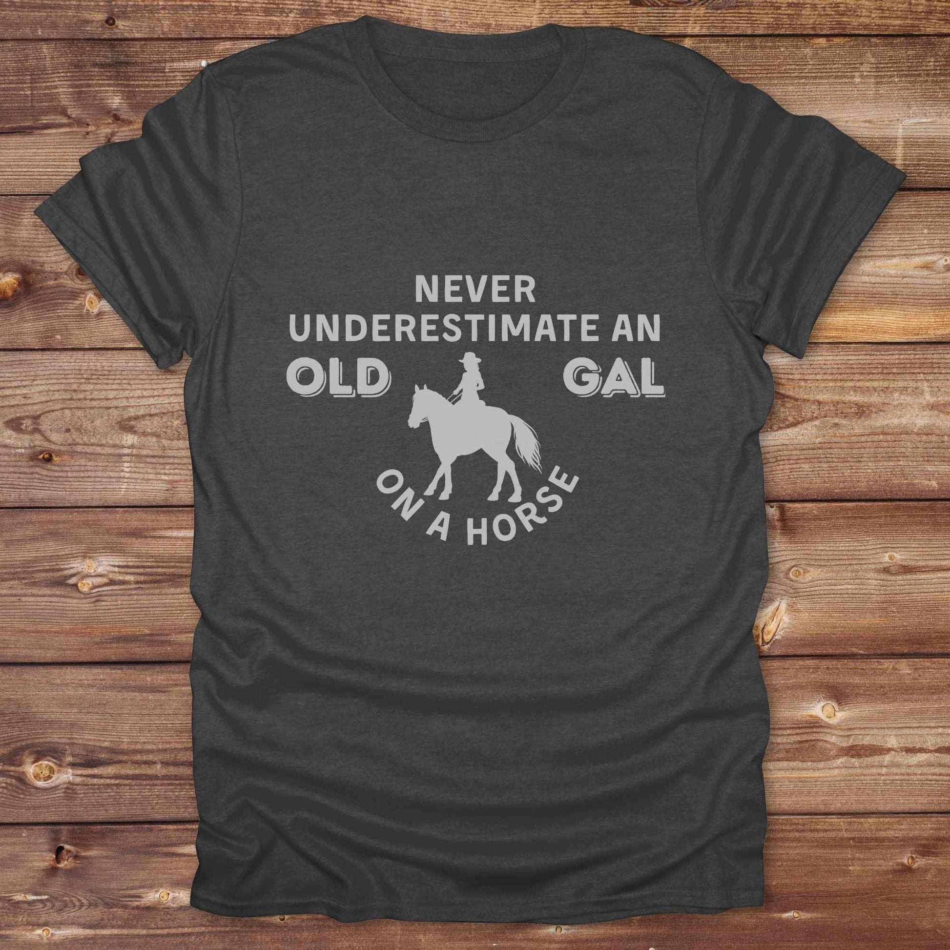 dark heather grey Never Underestimate an Old Gal on a Horse T-Shirt. Western Graphic Tee for Horse Lovers.