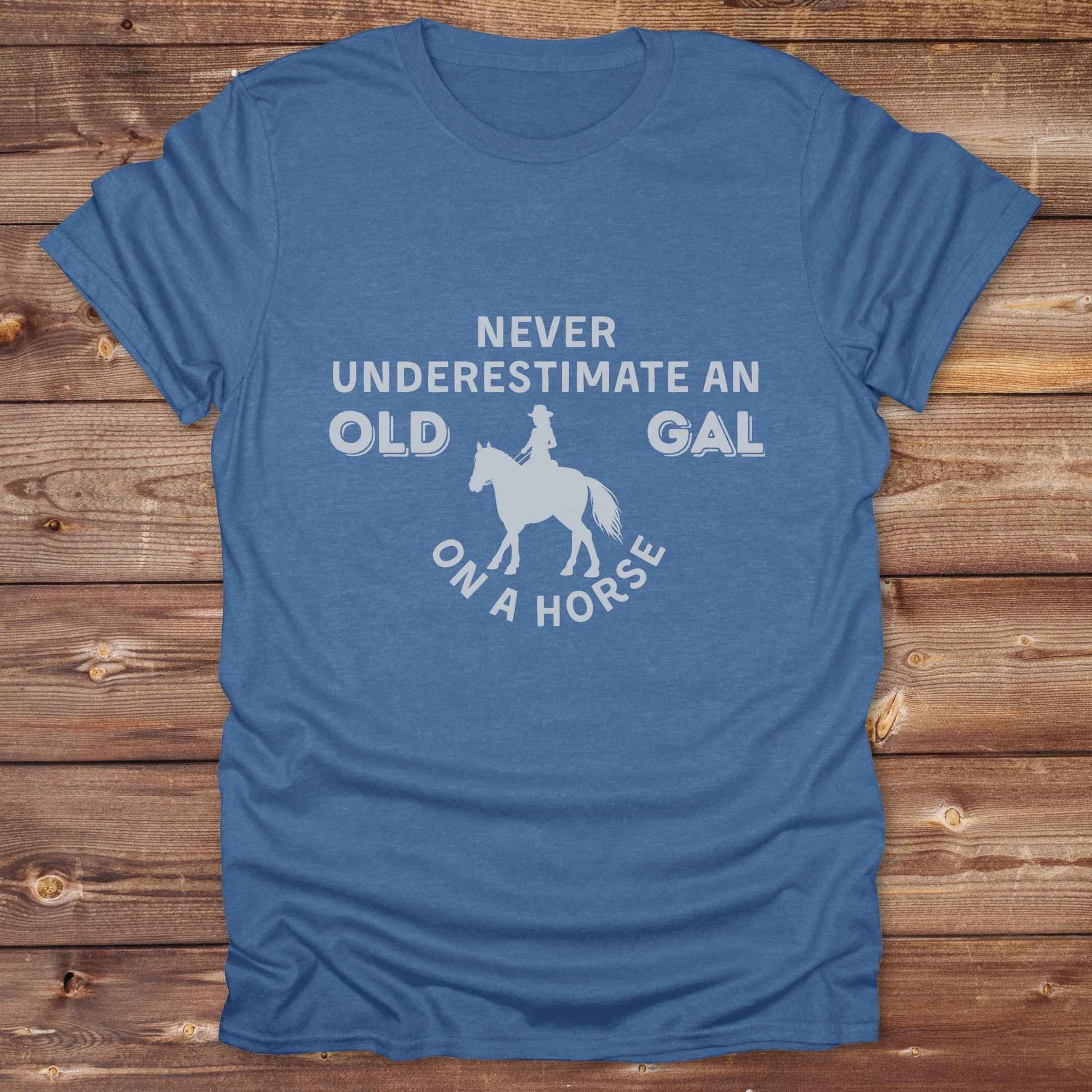 royal heather blue Never Underestimate an Old Gal on a Horse T-Shirt. Western Graphic Tee for Horse Lovers.