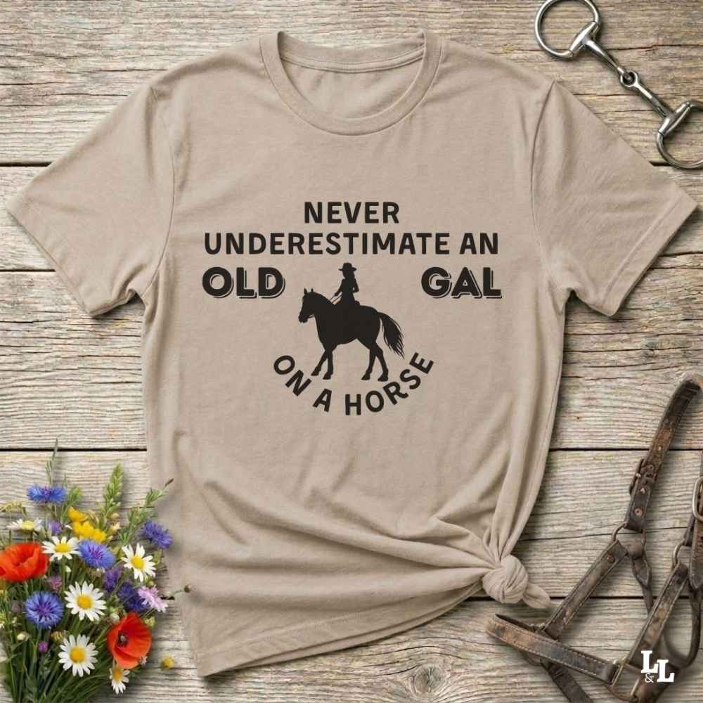beige Never Underestimate an Old Gal on a Horse T-Shirt. Western Graphic Tee for Horse Lovers.