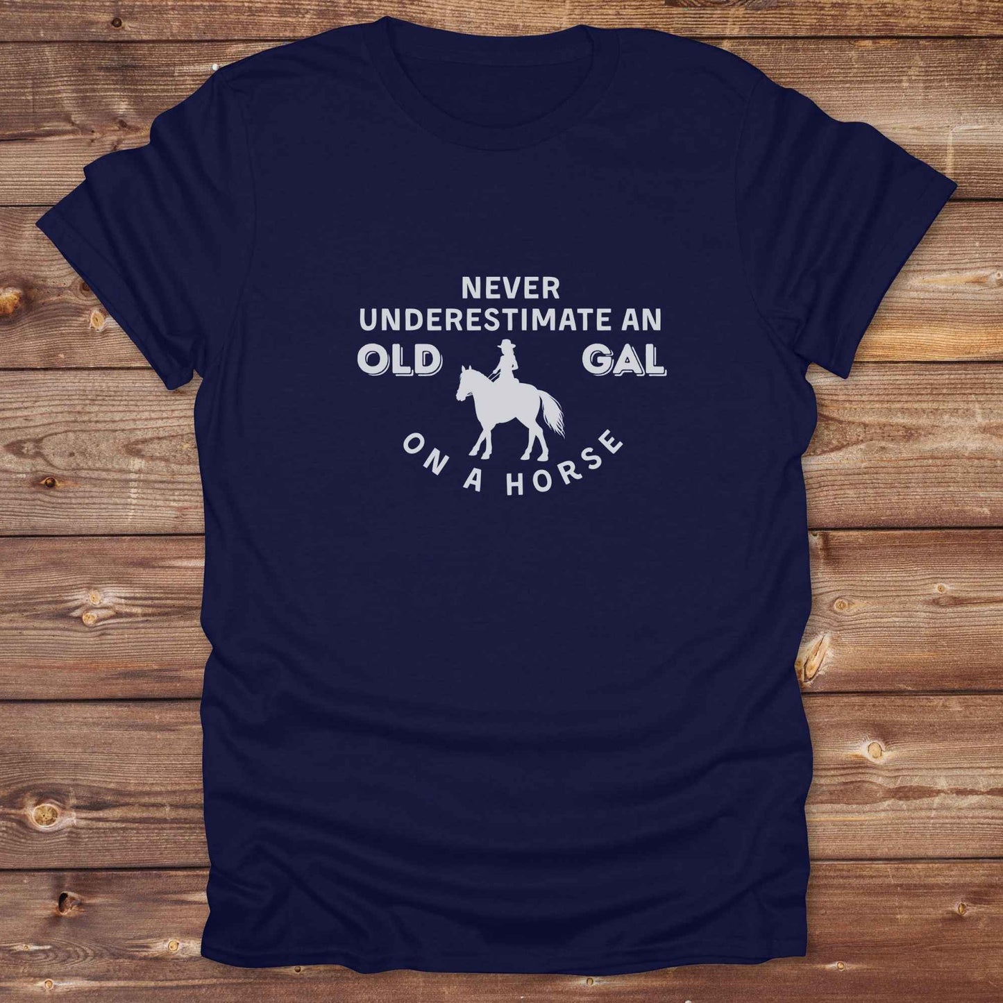 Fun western t-shirt for horse lovers and cowgirls. Western cowgirl graphic tee with horse design. Cowboy humor t-shirt for rodeo and country lovers. Horse lover funny t-shirt with western theme. Country style horse graphic tee for cowboys and cowgirls. Retro style funny western shirt for equestrians. Cute and funny country shirt with horse print. Southern cowgirl funny quote shirt for horse lovers. Never underestimate an old gal on a horse.