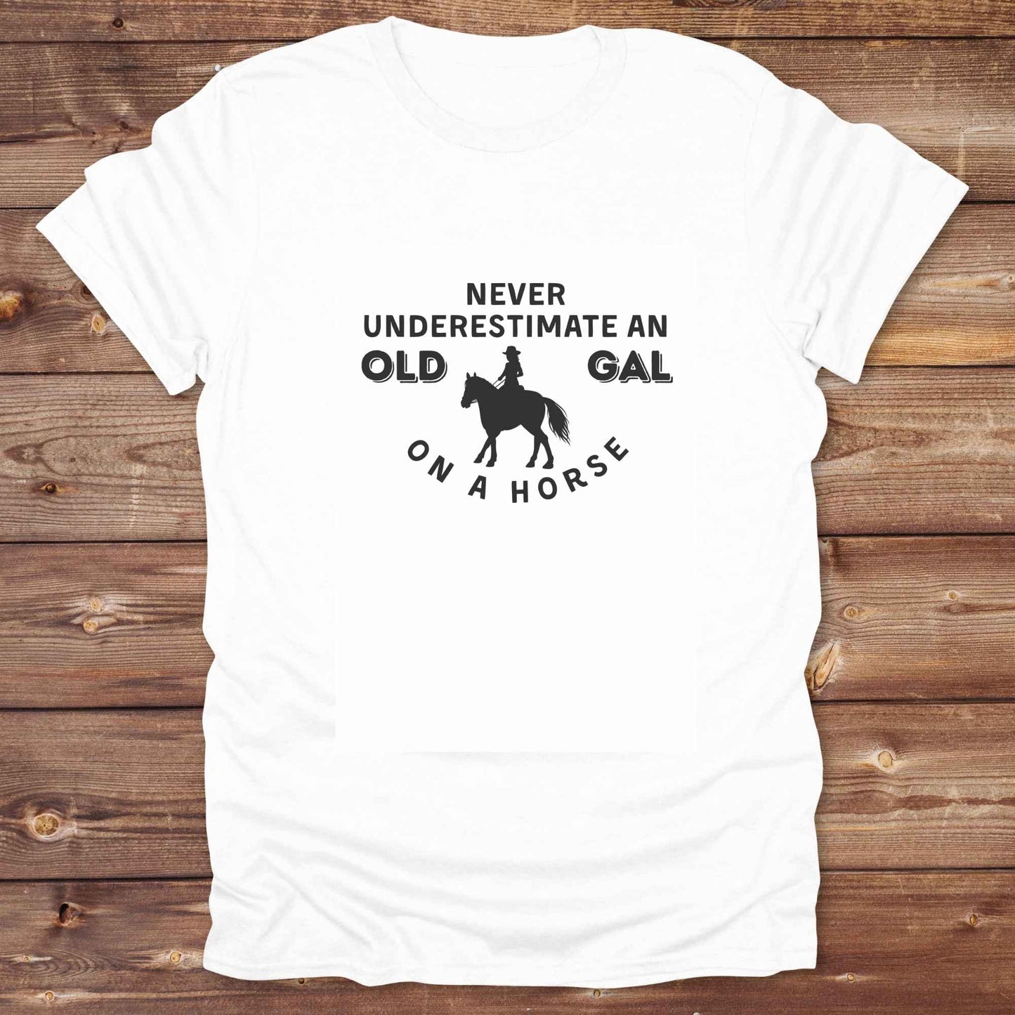Fun western t-shirt for horse lovers and cowgirls. Western cowgirl graphic tee with horse design. Cowboy humor t-shirt for rodeo and country lovers. Horse lover funny t-shirt with western theme. Country style horse graphic tee for cowboys and cowgirls. Retro style funny western shirt for equestrians. Cute and funny country shirt with horse print. Southern cowgirl funny quote shirt for horse lovers. Never underestimate an old gal on a horse.