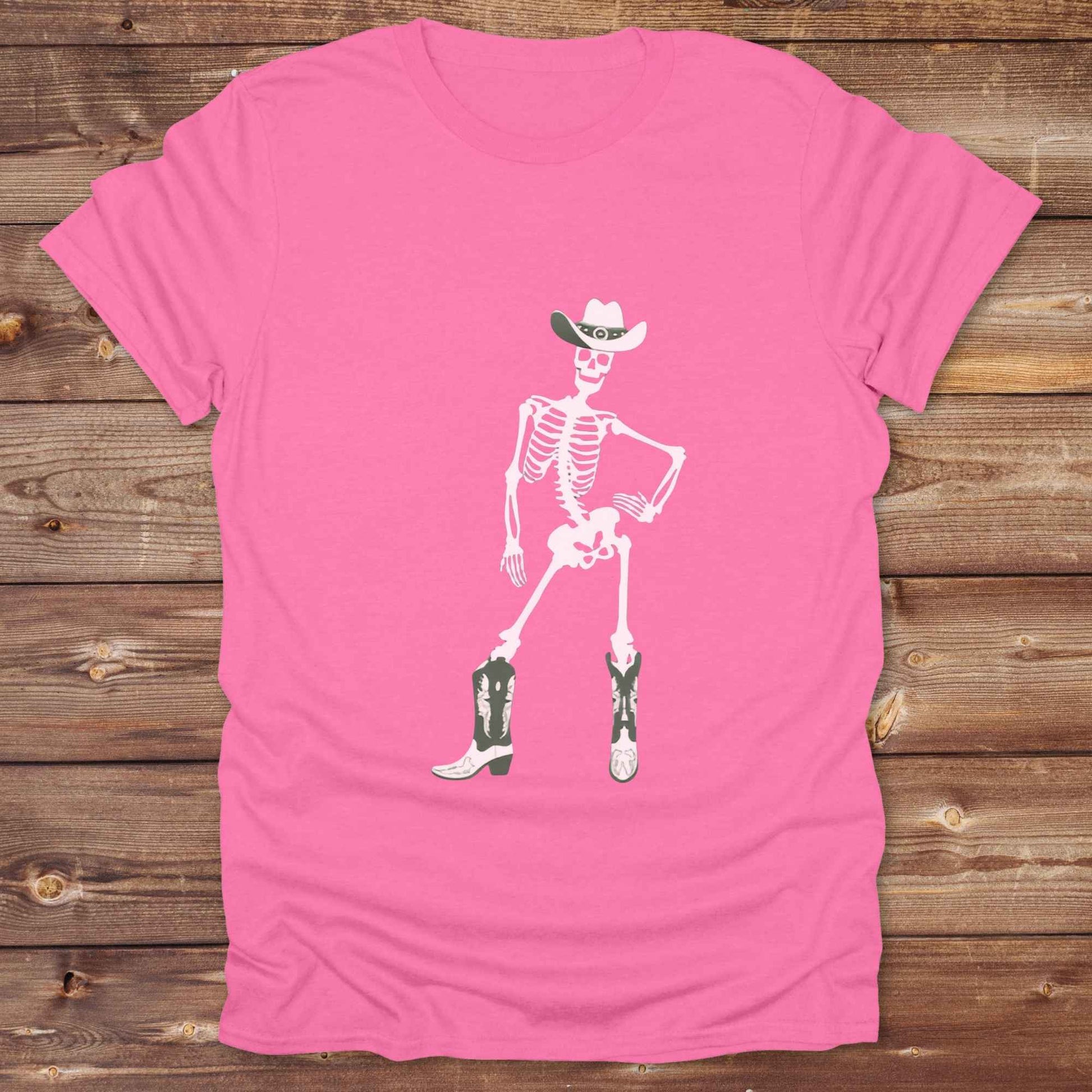 Cowgirl Skeleton T-Shirt is your ultimate spooky-season western tee — perfect for cowgirls, rodeo lovers, and horse fans who want to stand out. Featuring a bold white skeleton in cowboy boots and hat, it’s got that wild west attitude with Halloween sass. For gifting a country girl or dressing for a western Halloween, this tee turns heads and boots up sales. Great for cowgirl birthdays, rodeo fans, and those with spooky southern charm.