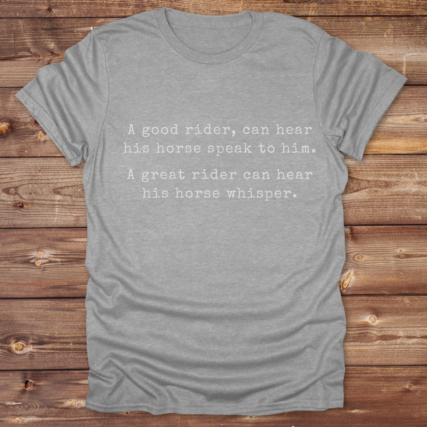 Celebrate the bond between rider and horse with this “A Good Rider... A Great Rider...” quote tee, designed for western style lovers, barn dwellers, and true horse whisperers. Whether you're gifting it to a trainer or adding it to your equestrian wardrobe, it’s perfect for trail rides, rodeos, and days spent in the saddle. Ideal for cowgirls, cowboys, and natural horsemanship enthusiasts who believe great riders hear the whispers. Shop now and bring barn wisdom to your closet.