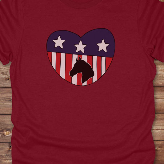 Celebrate your love for horses and the USA with our Horse Love USA T-Shirt, designed for western lifestyle lovers, cowgirls, and equestrian fans alike. Featuring a bold horse silhouette and a heart-shaped USA flag, this tee is perfect for USA horse riders who enjoy rustic country charm and humor. 