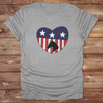 Celebrate your love for horses and the USA with our Horse Love USA T-Shirt, designed for western lifestyle lovers, cowgirls, and equestrian fans alike. Featuring a bold horse silhouette and a heart-shaped USA flag, this tee is perfect for USA horse riders who enjoy rustic country charm and humor. 