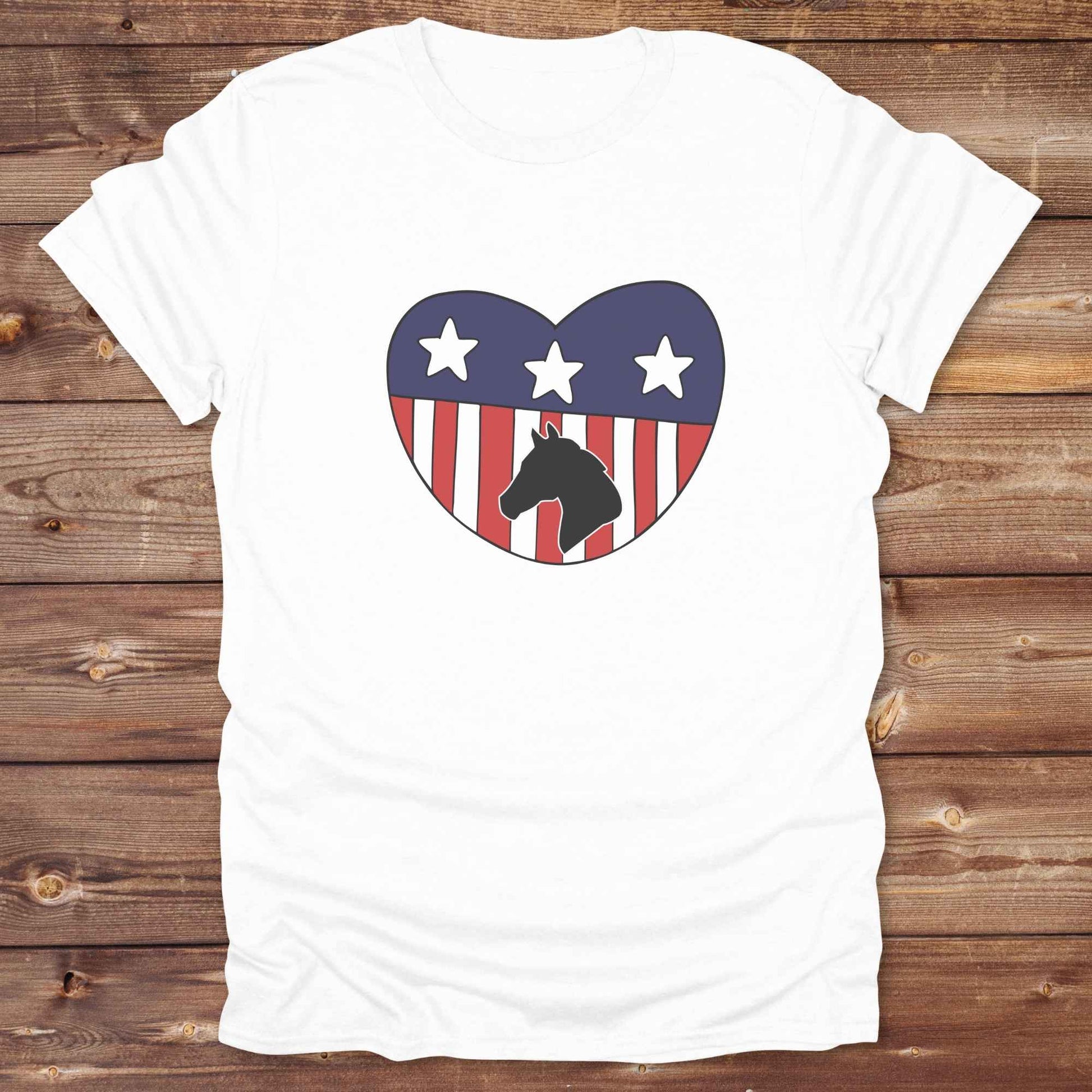 Celebrate your love for horses and the USA with our Horse Love USA T-Shirt, designed for western lifestyle lovers, cowgirls, and equestrian fans alike. Featuring a bold horse silhouette and a heart-shaped USA flag, this tee is perfect for USA horse riders who enjoy rustic country charm and humor. 