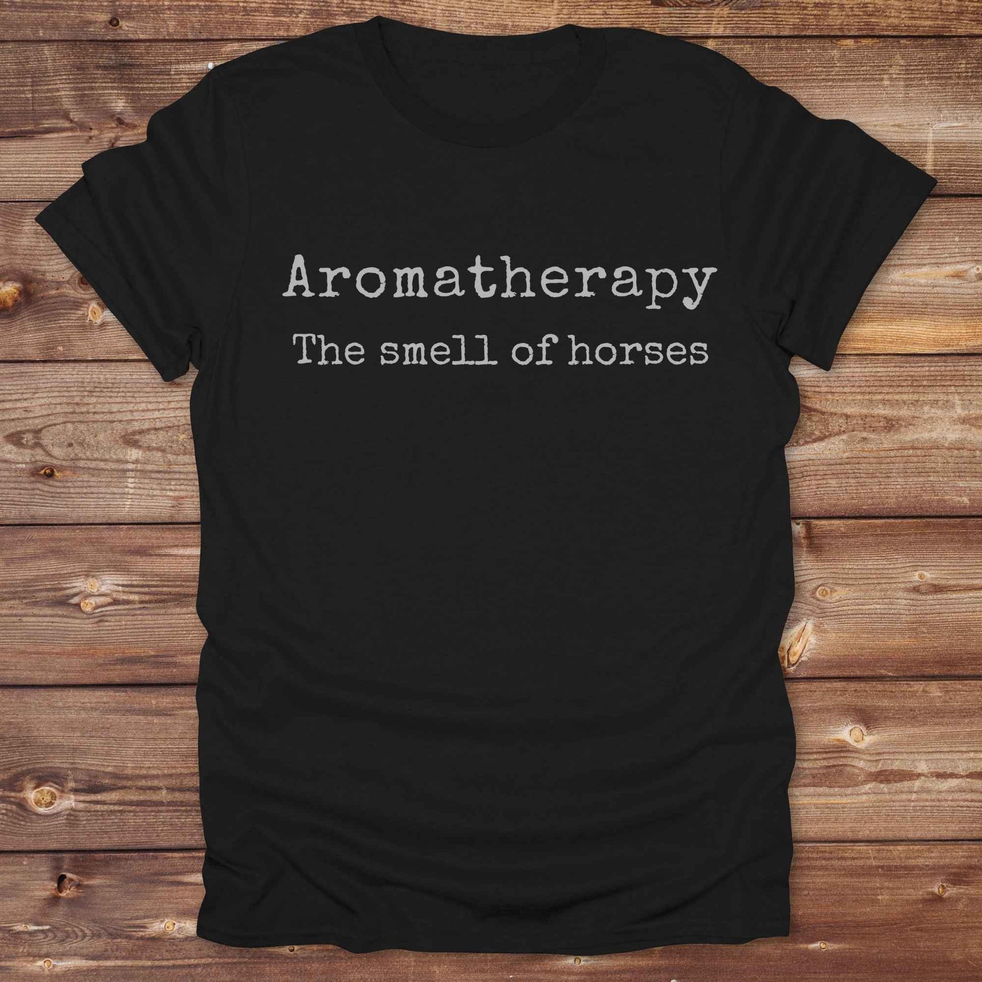 This "Aromatherapy: The Smell of Horses" t-shirt is perfect for cowgirls, horse moms, and equestrian fans who adore the unmistakable barn scent of saddles, hay, and horses. Designed with rustic charm and equine humor, it makes an ideal gift for western lifestyle lovers, riders, or anyone who finds peace in the smell of a stable. Whether it’s for rodeos, barn events, or lounging in the pasture, this tee says what every true horse lover knows.