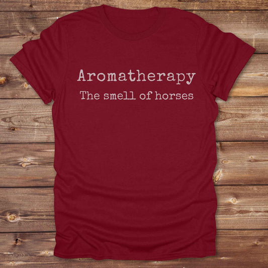 This "Aromatherapy: The Smell of Horses" t-shirt is perfect for cowgirls, horse moms, and equestrian fans who adore the unmistakable barn scent of saddles, hay, and horses. Designed with rustic charm and equine humor, it makes an ideal gift for western lifestyle lovers, riders, or anyone who finds peace in the smell of a stable. Whether it’s for rodeos, barn events, or lounging in the pasture, this tee says what every true horse lover knows.
