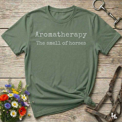 green This "Aromatherapy: The Smell of Horses" t-shirt is perfect for cowgirls, horse moms, and equestrian fans who adore the unmistakable barn scent of saddles, hay, and horses. Designed with rustic charm and equine humor, it makes an ideal gift for western lifestyle lovers, riders, or anyone who finds peace in the smell of a stable. Whether it’s for rodeos, barn events, or lounging in the pasture, this tee says what every true horse lover knows.