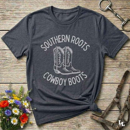 gray tee. Celebrate your country soul with our “Southern Roots Cowboy Boots” graphic tee perfect for cowgirls, rodeo lovers, and anyone who lives for barn life and western fashion. Featuring bold western typography and iconic cowboy boots artwork, this shirt is a must have for horse lovers and southern style fans alike. Ideal for gifts, rodeo events, or everyday rustic living, it’s designed for comfort, style, and soul. Whether you're headed to the stables, the saloon, or Sunday brunch on the farm.