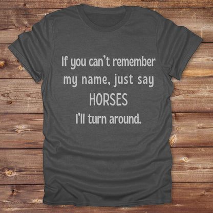 Get noticed with our hilarious “If You Can’t Remember My Name, Shout Horses” t-shirt designed for cowgirls, cowboys, and horse lovers who live for western humor and barn life. This bold, rustic graphic tee is a perfect gift for birthdays, rodeo events, or just showing off your horse obsession. Made for comfort and laughs, it's the ideal shirt for stables, trail rides, and every country concert. Cowgirl up and shout your style loud and proud. From rustic charm to rodeo ready sass, this shirt says it all!