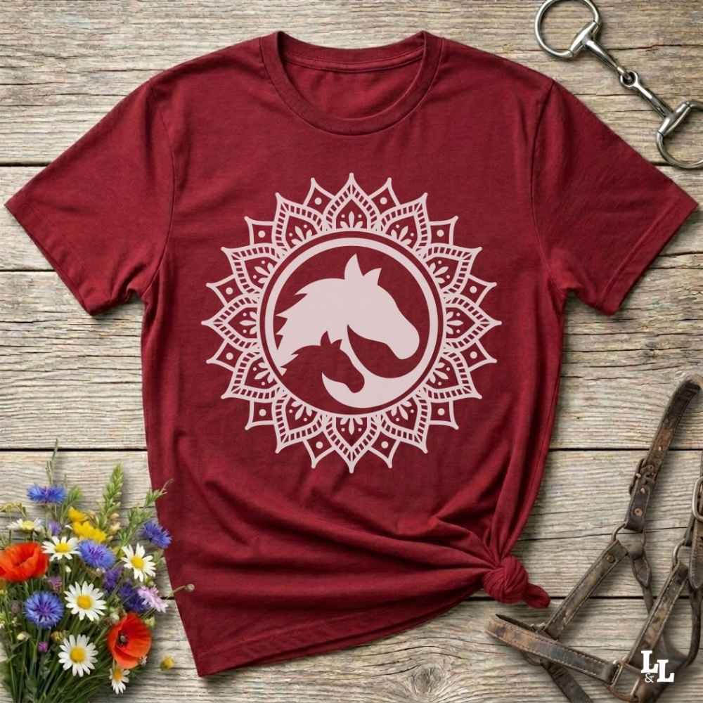 red Mandala Horse T-Shirt combines boho spirituality and western soul, perfect for cowgirls, cowboys, horse lovers, and rodeo fans. Features an intricate mandala design with a majestic horse at the center, this tee speaks to those who love rustic country style with spiritual flair. Whether you're trail riding, heading to a barn dance, or simply showing off your equestrian pride, this shirt is the ideal blend of comfort and expression. Designed for mindful western wearers and horse lovers alike, birthdays