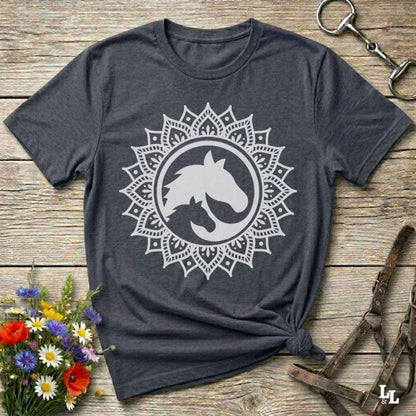 gray Mandala Horse T-Shirt combines boho spirituality and western soul, perfect for cowgirls, cowboys, horse lovers, and rodeo fans. Features an intricate mandala design with a majestic horse at the center, this tee speaks to those who love rustic country style with spiritual flair. Whether you're trail riding, heading to a barn dance, or simply showing off your equestrian pride, this shirt is the ideal blend of comfort and expression. Designed for mindful western wearers and horse lovers alike, birthdays