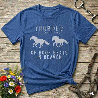 Saddle up with our “Hoof Beats in Heaven” Western blue Tee – the perfect tribute to your love for horses, riding, and country life. Featuring bold galloping horse graphics and the quote “Thunder is the sound of hoof beats in heaven,” this shirt is made for cowgirls, cowboys, and western soul seekers. Ideal for rodeo lovers, country music fans, and horse memorial gifts. It’s a versatile piece for ranch days, casual outings, or as a thoughtful gift.