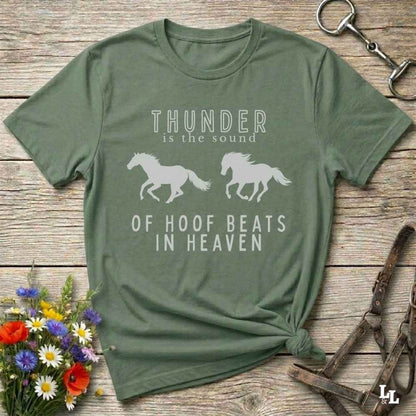 Saddle up with our “Hoof Beats in Heaven” Western Tee – the perfect tribute to your love for horses, riding, and country life. Featuring bold galloping horse graphics and the quote “Thunder is the sound of hoof beats in heaven,” this shirt is made for cowgirls, cowboys, and western soul seekers. Ideal for rodeo lovers, country music fans, and horse memorial gifts. It’s a versatile piece for ranch days, casual outings, or as a thoughtful gift.