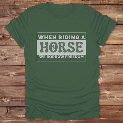 Wear your spirit of freedom with our Borrow Freedom Horse T‑Shirt. Perfect for cowgirls, cowboys, rodeo lovers, and horse enthusiasts, this western graphic tee combines vintage charm with modern comfort. A standout gift idea for birthdays, anniversaries, or just because this unisex horse lover shirt elevates country style while celebrating equestrian passion.