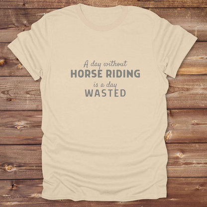 sand beige western tee with horse lover quote. Day without riding is a day wasted. Funny tee for birthday gifts.