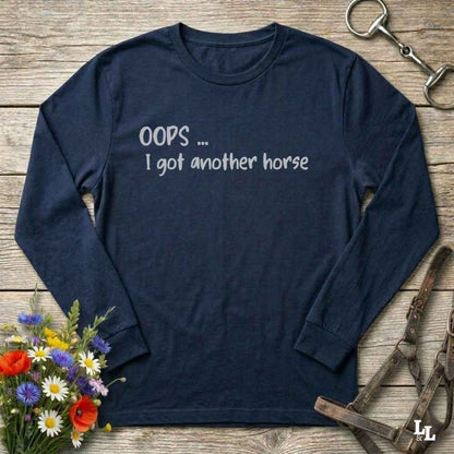 A blue  long-sleeve t-shirt with the text 'OOPS ... I got another horse'