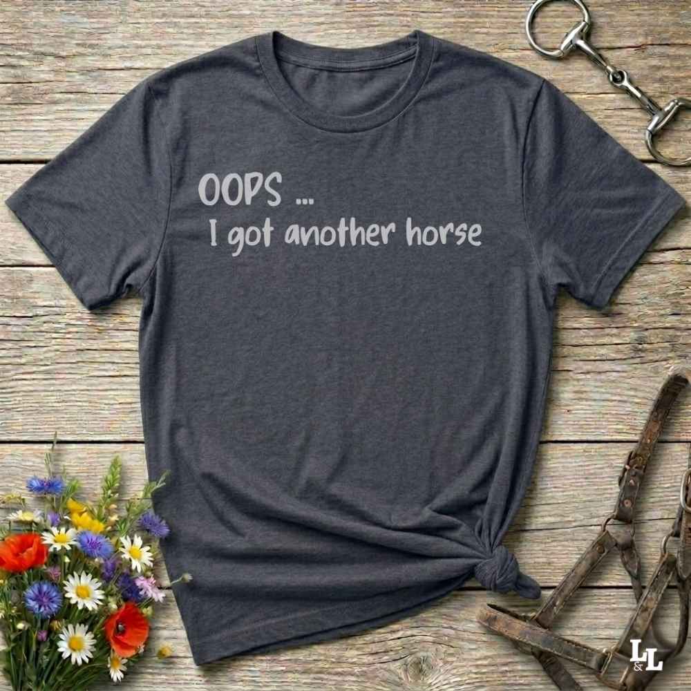 A dark charcoal gray graphic t-shirt with the text 'OOPS .... I got another horse'