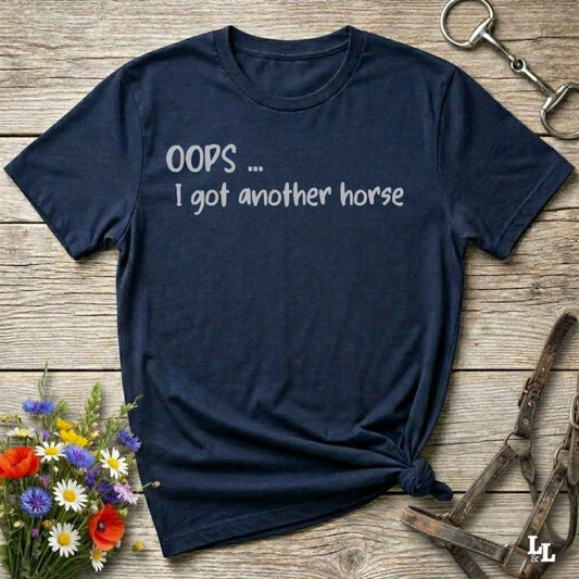 A navy blue short-sleeve t-shirt with the text 'OOPS ... I got another horse'
