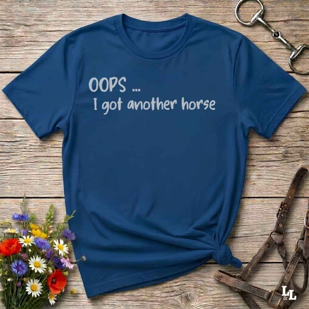 A navy blue short-sleeve t-shirt with the text 'OOPS .... I got another horse'