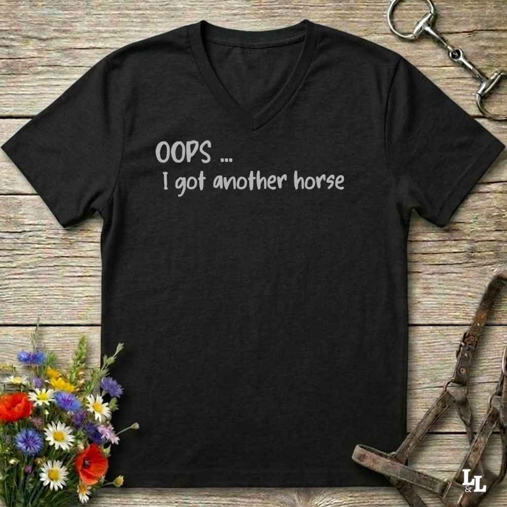 A black V-neck t-shirt with the text 'OOPS .