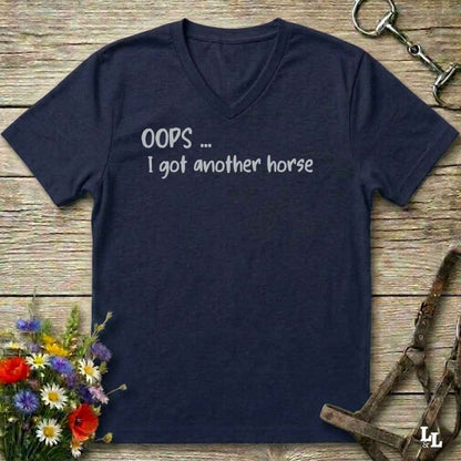 A navy blue V-neck t-shirt with the text 'OOPS .